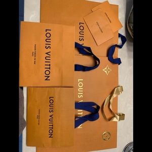 Authentic Louis Vuitton shopping bags